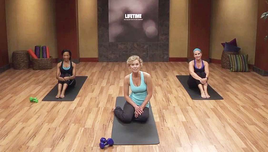Three woman on yoga mats