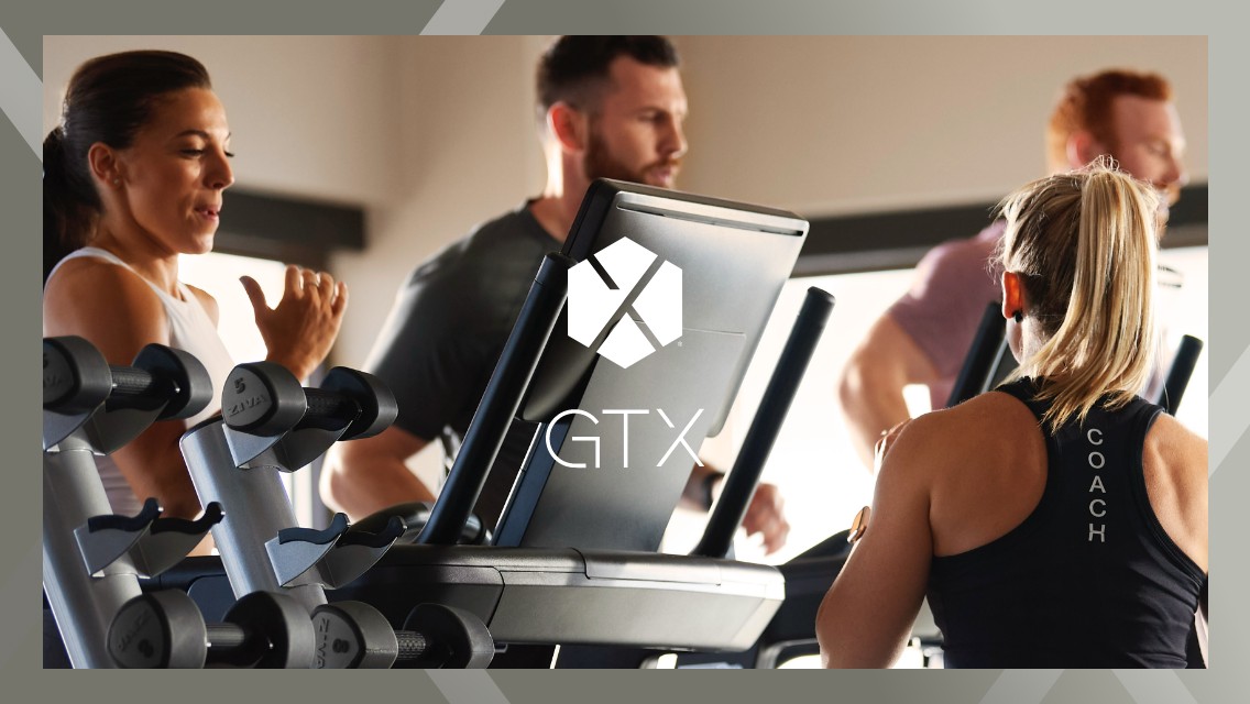 The GTX logo over an image of a group of people running on a treadmill