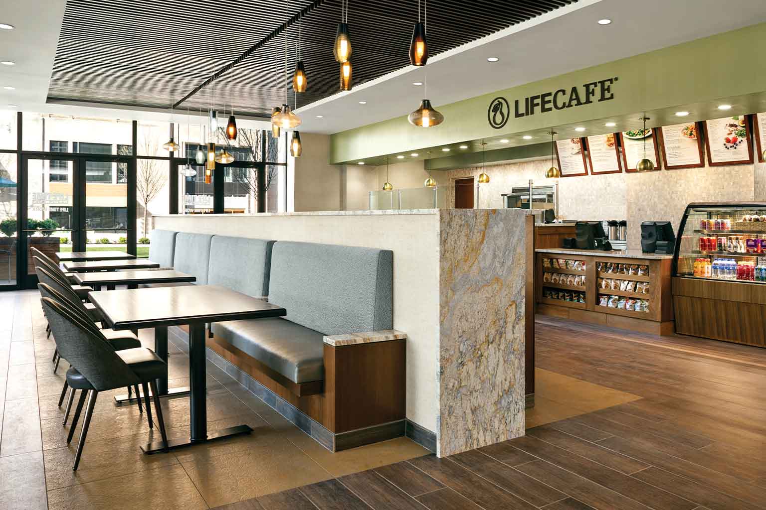 Booth seating and ordering counter at a Life Cafe
