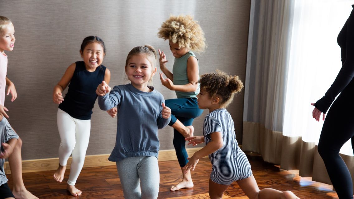 A group of children dancing in a Kids Academy Class 