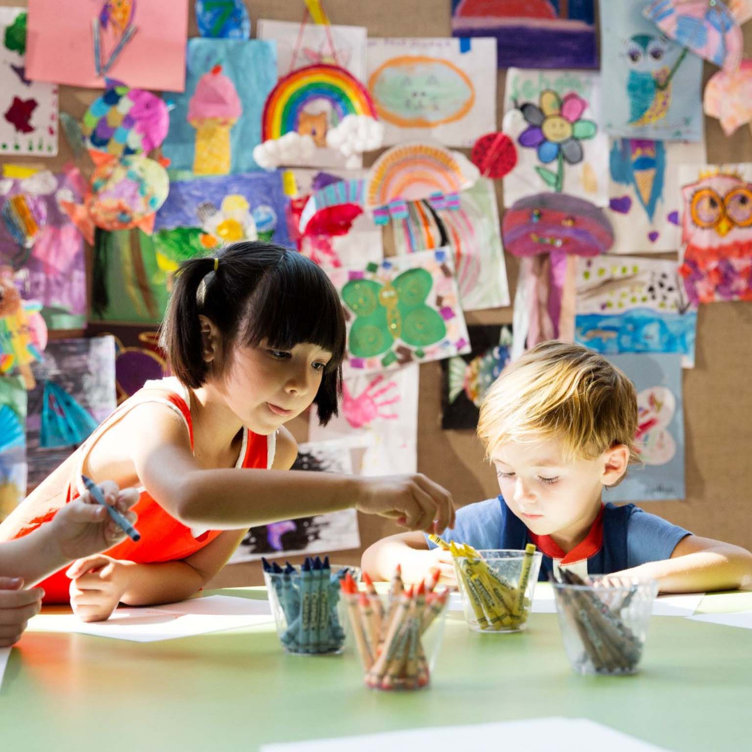 A group of children doing crafts together