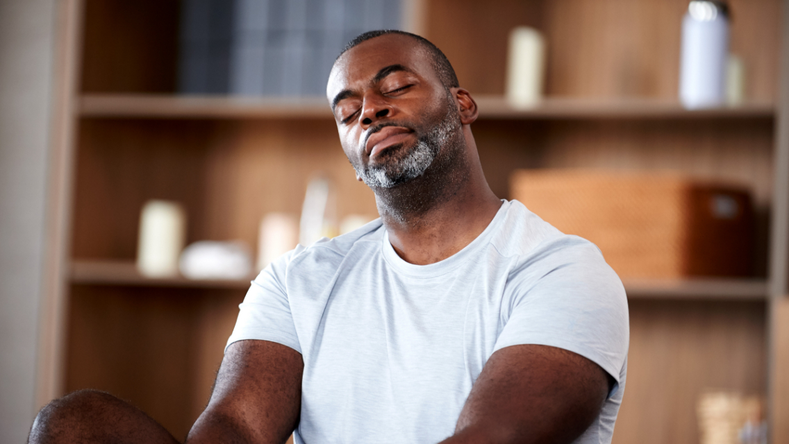 Man relaxing with his eyes closed