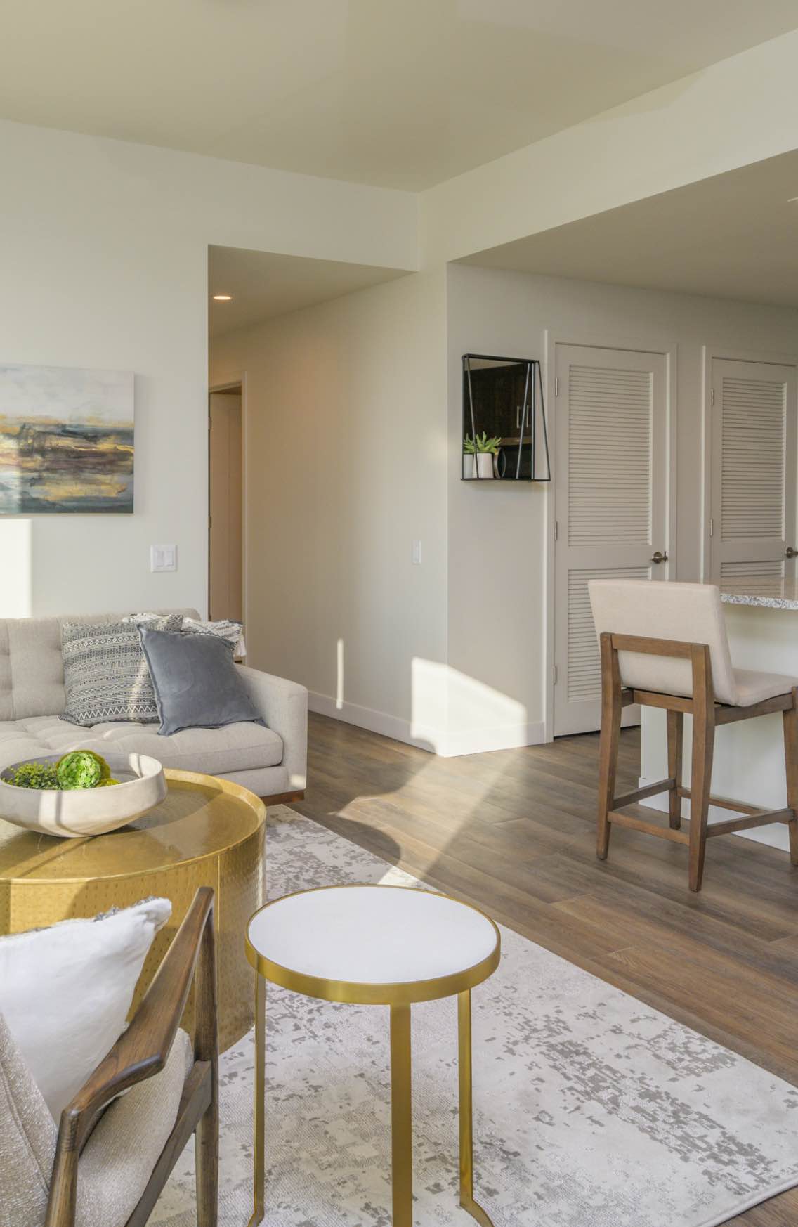 Interior of an upscale bedroom and shared living space at Life Time Living. 