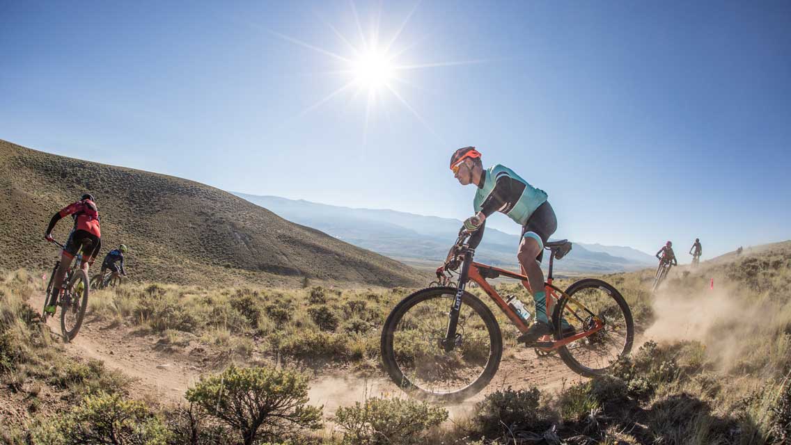 a man riding his bike 