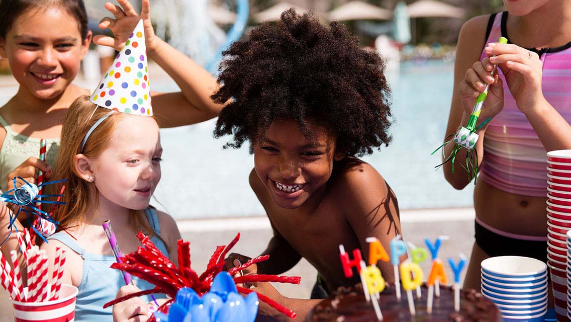 Kids laughing at a birthday party