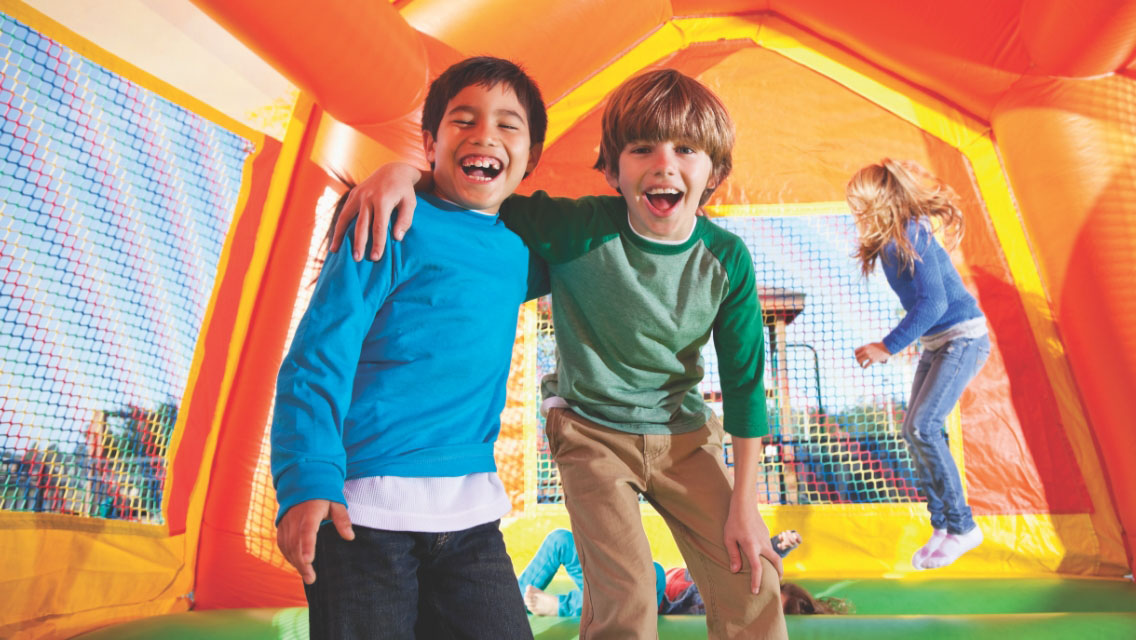 Two boys in a jump house