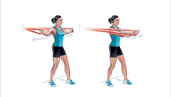 Woman working out with resistance bands