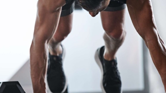 Man working out in an UltraFit class at Life Time