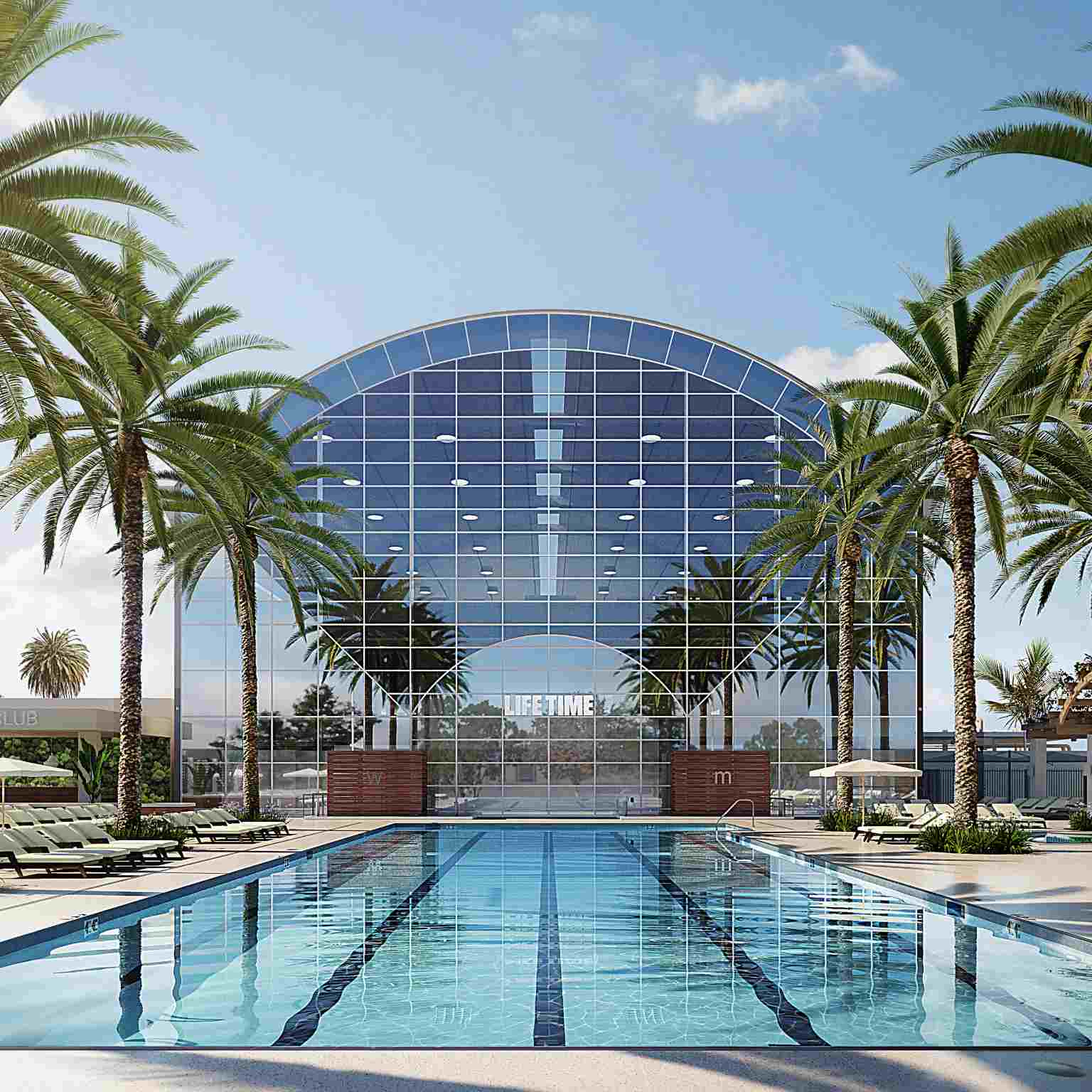 Exterior of a Life Time building with an outdoor pool lined with palm trees