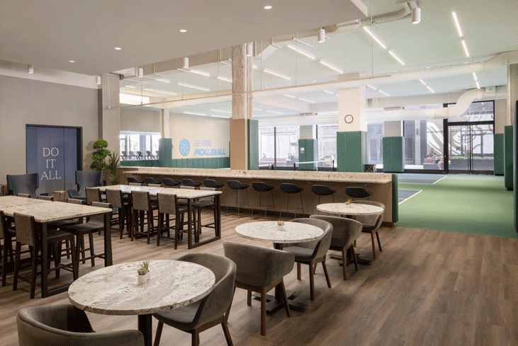 lounge area alongside indoor pickleball courts