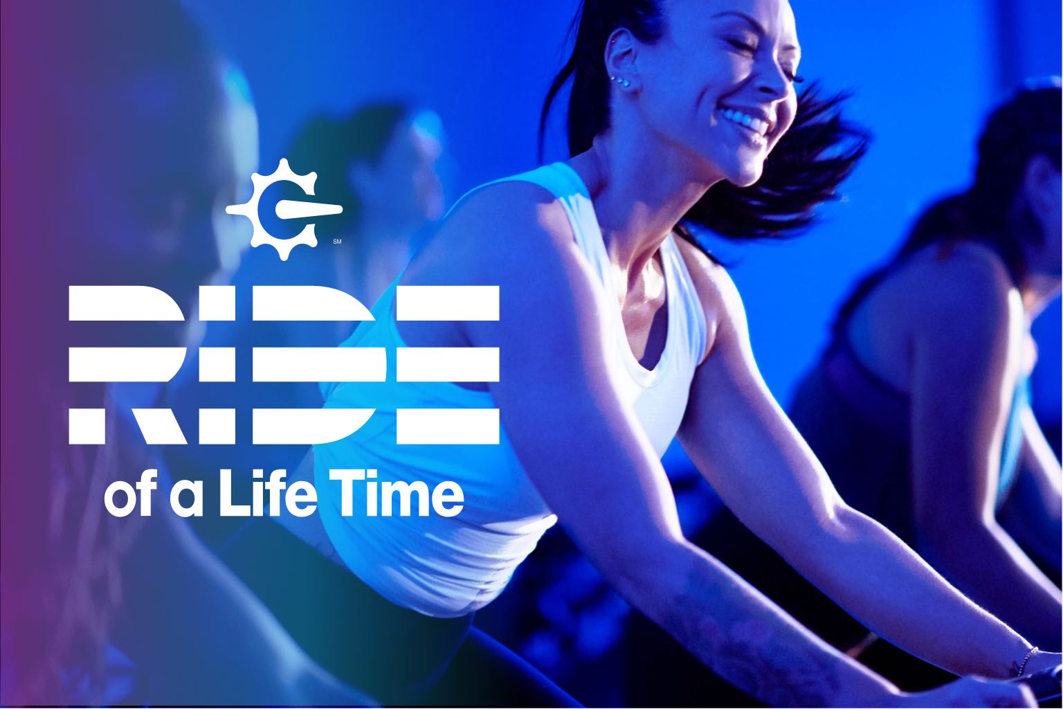 woman smiling on bike with Ride of a Life Time logo