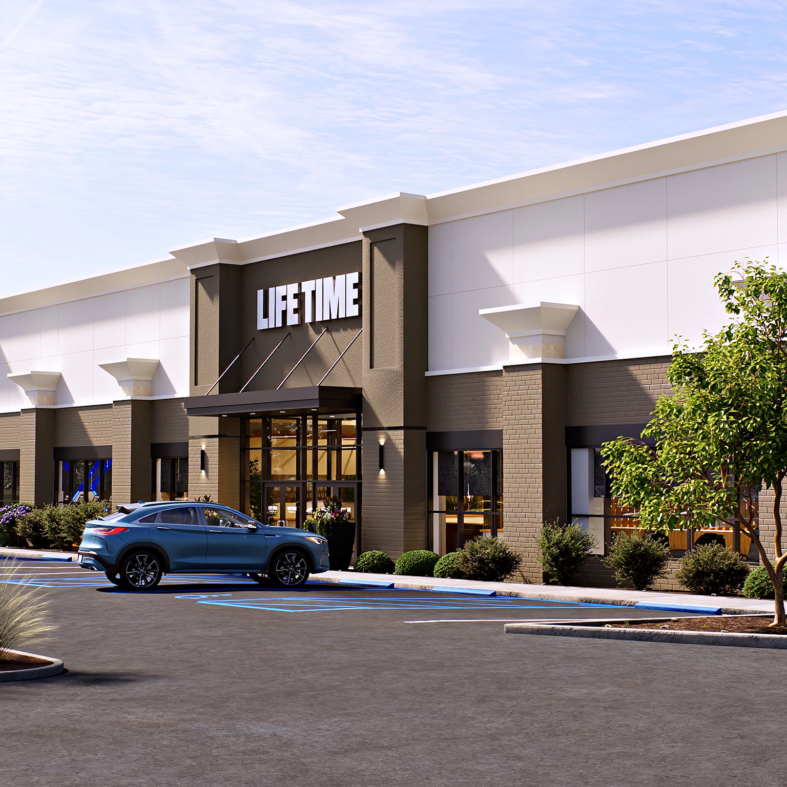 Exterior of a Life Time building with skyscrapers in background.