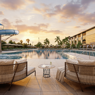 outdoor pool, lounge area and slide at Life Time