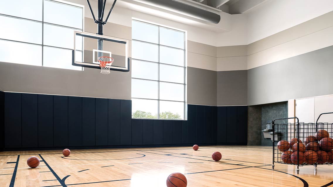 Indoor basketball court at Life Time. 