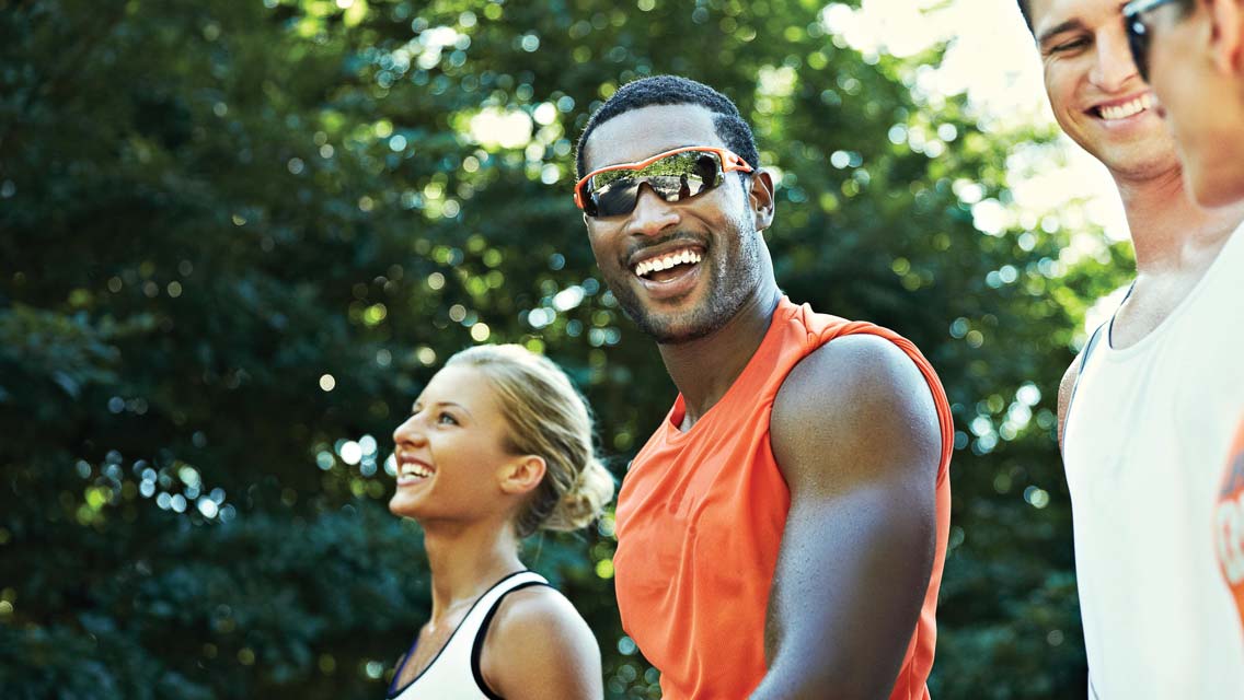 a group of athletic adults in a run club 