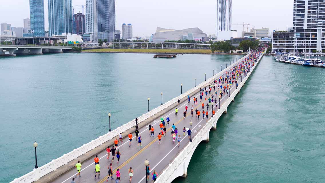 a group running in the Miami marathon